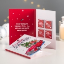 Шоколадная открытка Счастливого Нового Года. Красная машина с новогодней елкой